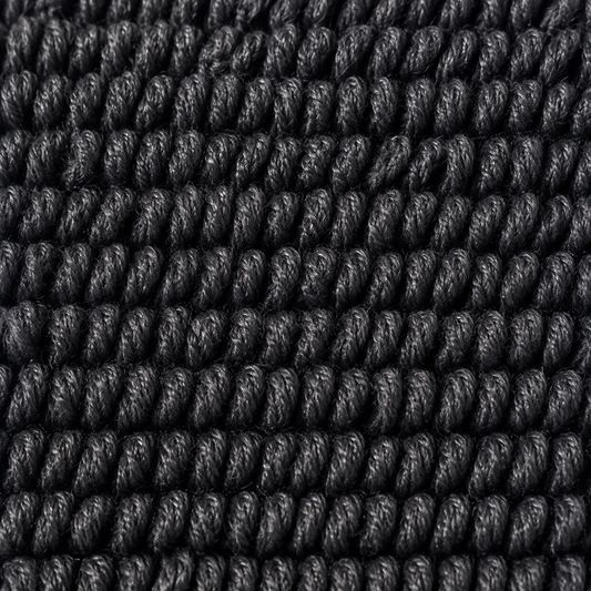 Macro du tissage twisted loop : boucles torsadées sur elles-mêmes, serrées et régulières